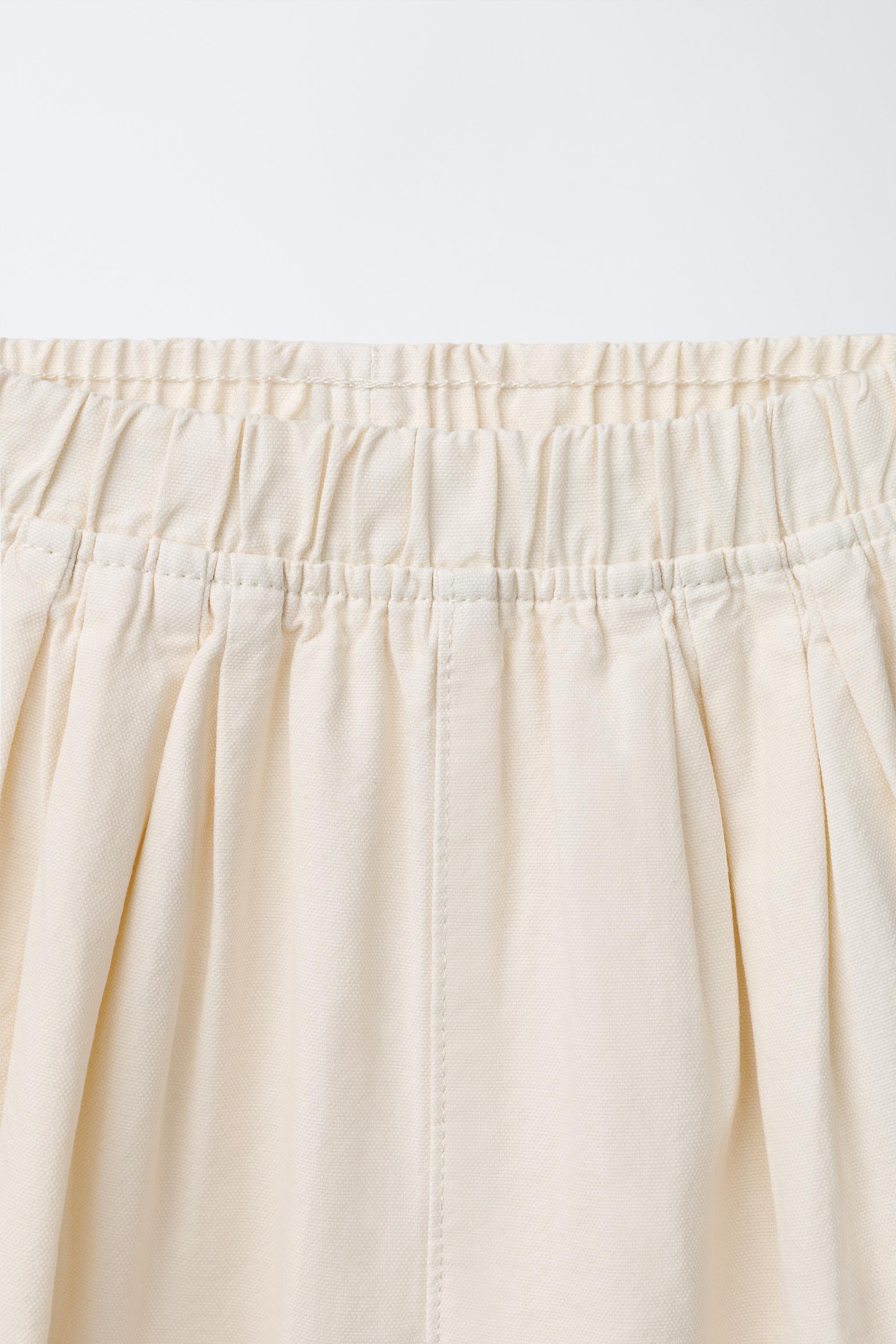 PANTALON BALLON EN TOILE AVEC ÉTIQUETTE